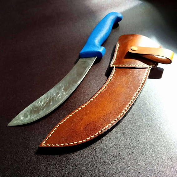 Leather sheath. Sarung kulit pisau lapah dan sembelih