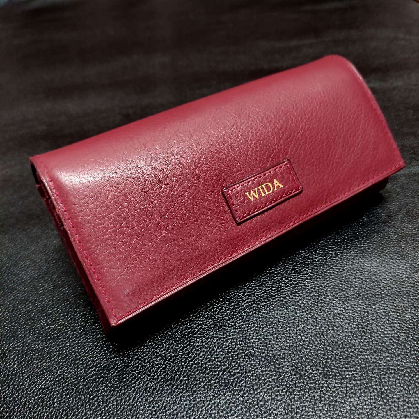 Long women’s purse in Maroon Lychee embossed leather