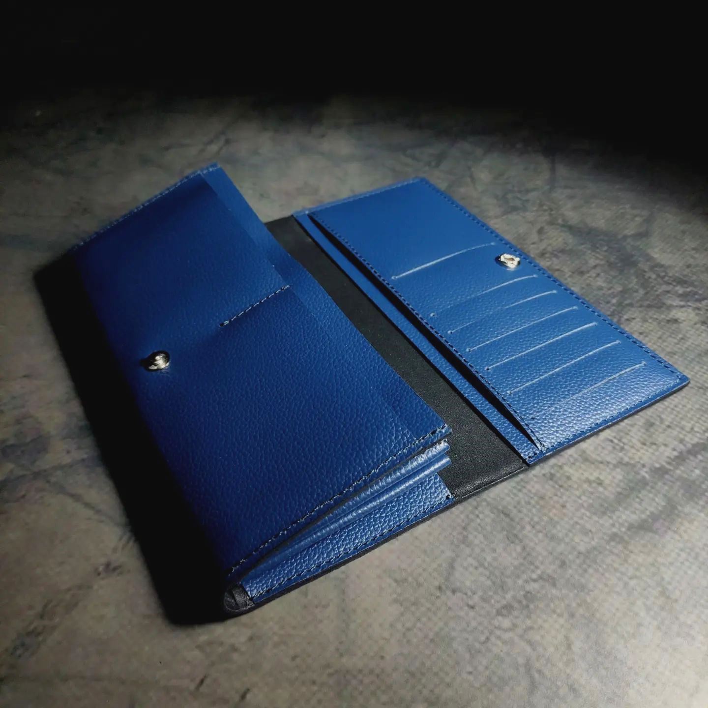 Long women’s purse in Blue Lychee embossed leather